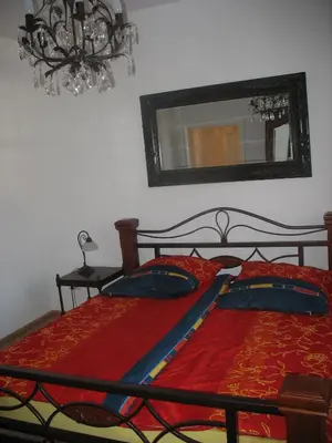 Ein Bett oder Betten in einem Zimmer der Unterkunft Ferienwohnung Westend-Grunewald