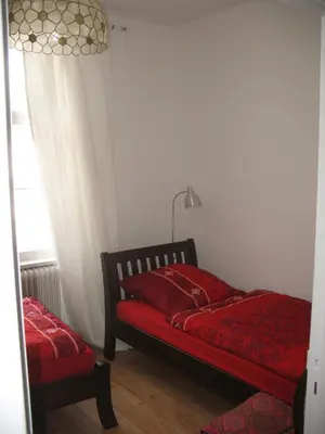 Ein Bett oder Betten in einem Zimmer der Unterkunft Ferienwohnung Westend-Grunewald