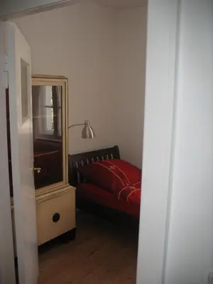 Ein Bett oder Betten in einem Zimmer der Unterkunft Ferienwohnung Westend-Grunewald