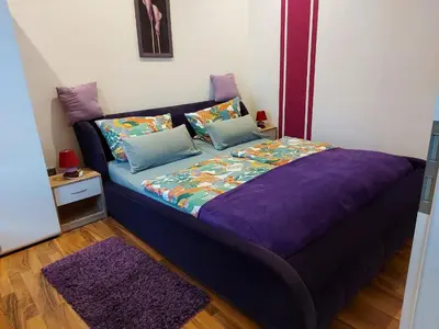Ein Bett oder Betten in einem Zimmer der Unterkunft Ferienwohnung Mahlsdorf