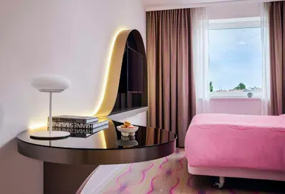 Ein Bett oder Betten in einem Zimmer der Unterkunft nhow Berlin