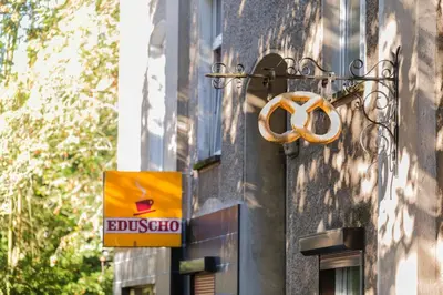 Ein Zertifikat, Auszeichnung, Logo oder anderes Dokument, das in der Unterkunft Berlin City Apartments ausgestellt ist