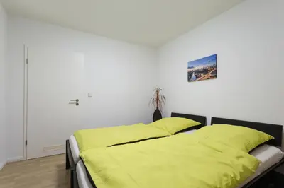 Ein Bett oder Betten in einem Zimmer der Unterkunft Berlin City Apartments