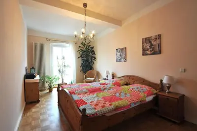 Ein Bett oder Betten in einem Zimmer der Unterkunft Wohnung mit Blick über Potsdam