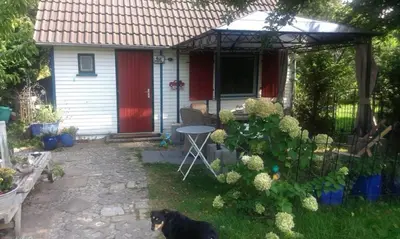 Ein Garten an der Unterkunft Das kleine Ferienhaus
