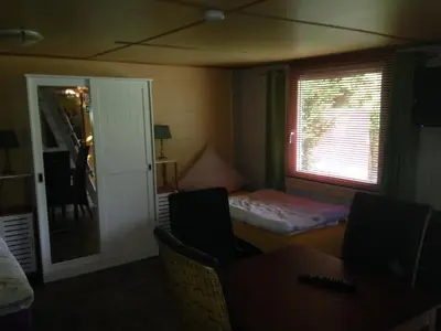 Ein Bett oder Betten in einem Zimmer der Unterkunft Das kleine Ferienhaus