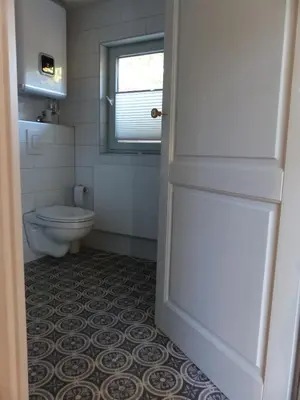 Ein Badezimmer in der Unterkunft Feine Laube