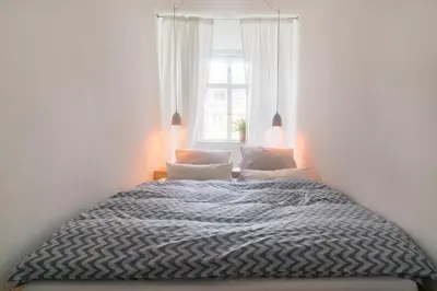 Ein Bett oder Betten in einem Zimmer der Unterkunft Design Apartments - 
