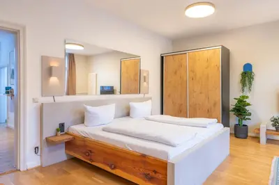 Ein Bett oder Betten in einem Zimmer der Unterkunft Design Apartments - 