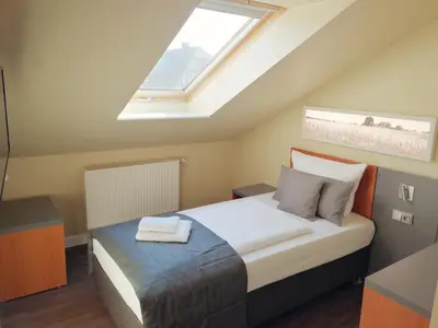 Ein Bett oder Betten in einem Zimmer der Unterkunft Gut Gnewikow
