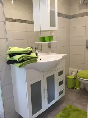 Ein Badezimmer in der Unterkunft Bungalow am Schwielochsee