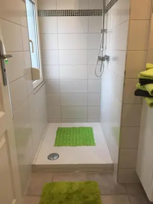 Ein Badezimmer in der Unterkunft Bungalow am Schwielochsee