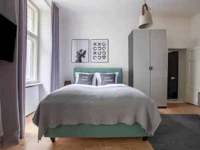 Ein Bett oder Betten in einem Zimmer der Unterkunft Apartment Berlin Kaiser-Friedrich-Straße