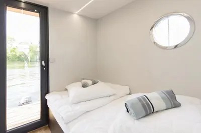 Ein Bett oder Betten in einem Zimmer der Unterkunft Marina Niederhavel
