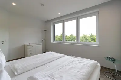 Ein Bett oder Betten in einem Zimmer der Unterkunft Marina Niederhavel