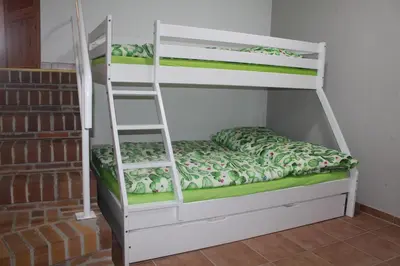 Ein Bett oder Betten in einem Zimmer der Unterkunft Spreewald Ferienwohnung Lübben