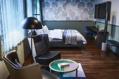 Ein Bett oder Betten in einem Zimmer der Unterkunft The Circus Hotel