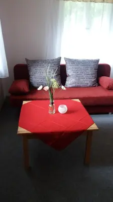 Ein Sitzbereich in der Unterkunft Ferienhaus am Langen See