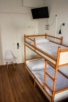 Ein Bett oder Betten in einem Zimmer der Unterkunft Metropol Hostel Berlin