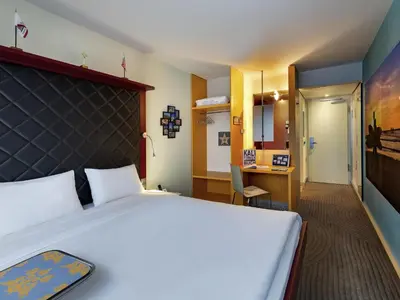Ein Bett oder Betten in einem Zimmer der Unterkunft ibis Styles Hotel Berlin Mitte