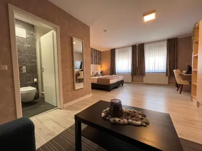 Ein Bett oder Betten in einem Zimmer der Unterkunft Novel Hotel