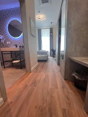 Ein Bett oder Betten in einem Zimmer der Unterkunft Novel Hotel