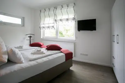 Ein Bett oder Betten in einem Zimmer der Unterkunft Am Schmeding