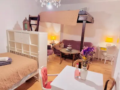 Ein Bett oder Betten in einem Zimmer der Unterkunft Romantic Studio
