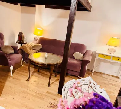 Ein Sitzbereich in der Unterkunft Romantic Studio