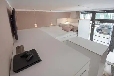 Ein Bett oder Betten in einem Zimmer der Unterkunft Modern Design Apartment