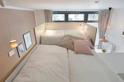Ein Bett oder Betten in einem Zimmer der Unterkunft Modern Design Apartment