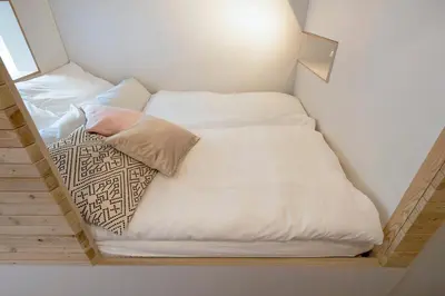 Ein Bett oder Betten in einem Zimmer der Unterkunft Modern Design Apartment