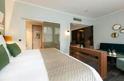 Ein Bett oder Betten in einem Zimmer der Unterkunft Leonardo Royal Hotel Berlin Alexanderplatz