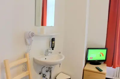 TV/Unterhaltungsangebot in der Unterkunft Pension Central Hostel Berlin