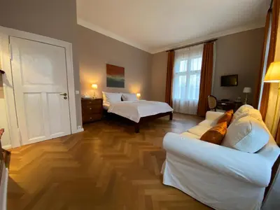 Ein Bett oder Betten in einem Zimmer der Unterkunft Schlosshotel Ziethen