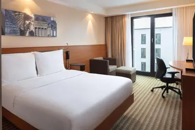 Ein Bett oder Betten in einem Zimmer der Unterkunft Hampton by Hilton Berlin City West
