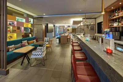 Ein Sitzbereich in der Unterkunft Hampton by Hilton Berlin City West