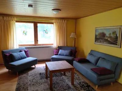 Ein Sitzbereich in der Unterkunft Ferien am Hegensteinbach