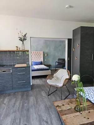 Ein Sitzbereich in der Unterkunft Hey Spreewald Ferienapartments