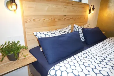 Ein Bett oder Betten in einem Zimmer der Unterkunft Hey Spreewald Ferienapartments