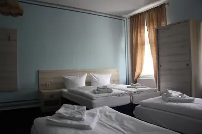 Ein Bett oder Betten in einem Zimmer der Unterkunft Hotel am Fluss