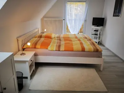 Ein Bett oder Betten in einem Zimmer der Unterkunft Fewo Berlin Tempelhof