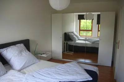 Ein Bett oder Betten in einem Zimmer der Unterkunft Wohnen auf Zeit am Golfplatz Motzen