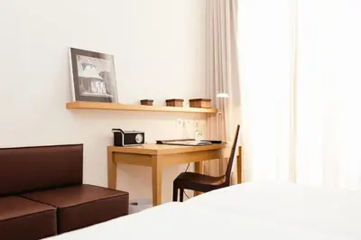 Ein Bett oder Betten in einem Zimmer der Unterkunft Hotel Brandenburger Tor Potsdam
