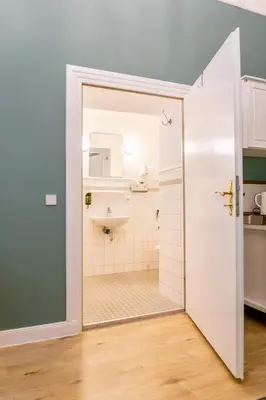 Küche/Küchenzeile in der Unterkunft Apartments-Maison Am Olivaer Platz