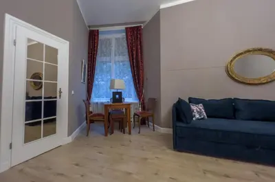Ein Sitzbereich in der Unterkunft Apartments-Maison Am Olivaer Platz