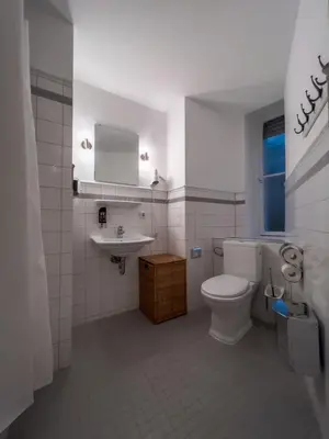 Ein Badezimmer in der Unterkunft Apartments-Maison Am Olivaer Platz