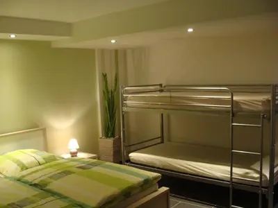 Ein Bett oder Betten in einem Zimmer der Unterkunft Ferienwohnung Rohrwallinsel Köpenick