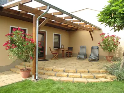Ein Garten an der Unterkunft Ferienwohnung Rohrwallinsel Köpenick