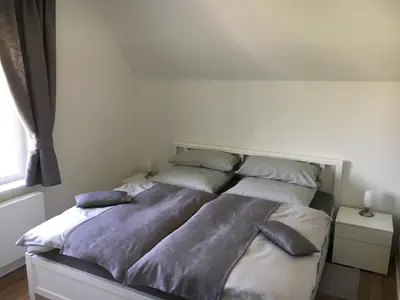 Ein Bett oder Betten in einem Zimmer der Unterkunft Potsdam-Krampnitz